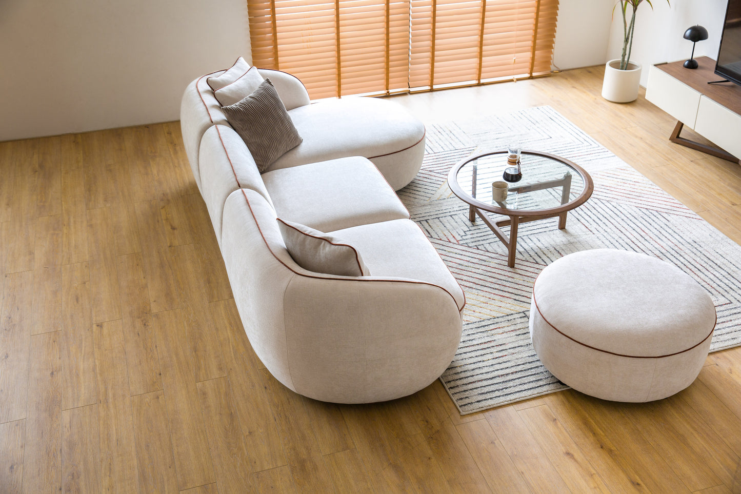 Yūgen Sectional and Ottoman Set