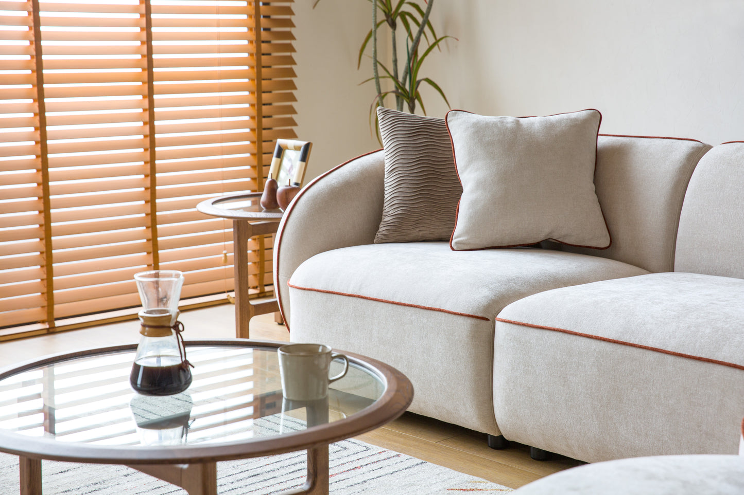 Yūgen Sectional and Ottoman Set